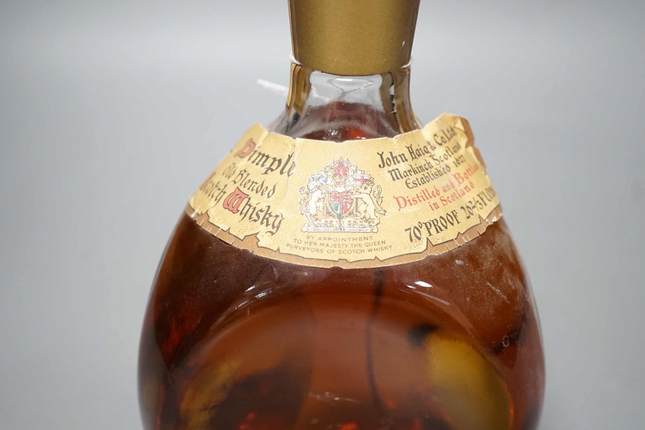 A bottle of Haig Dimple whisky